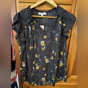 Black Ruffled Sleeveless Blouse with Yellow Floral Accents